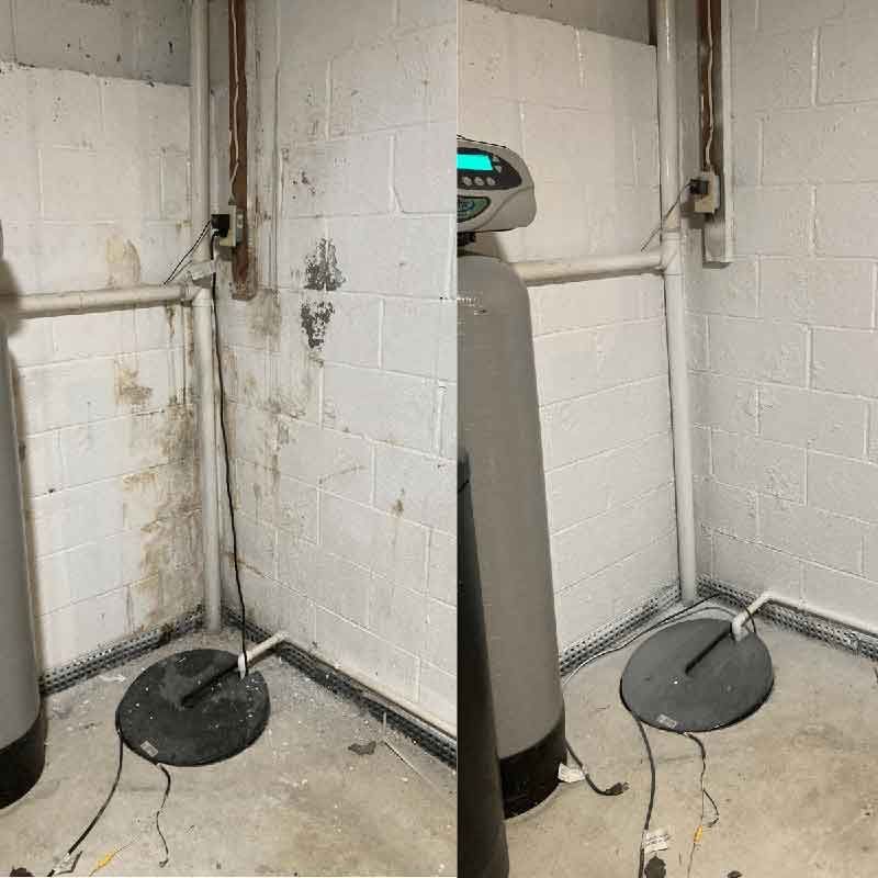 Basement wall cleaned and painted